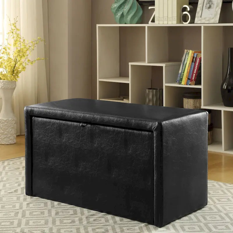 L'ensemble moderne de quatre pièces en similicuir comprend un banc et un tabouret.